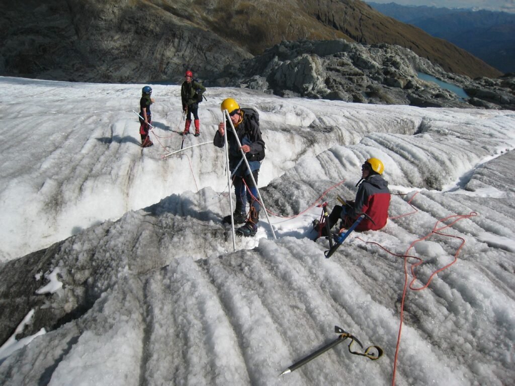 Measuring ablation stakes on the Brewster Glacier