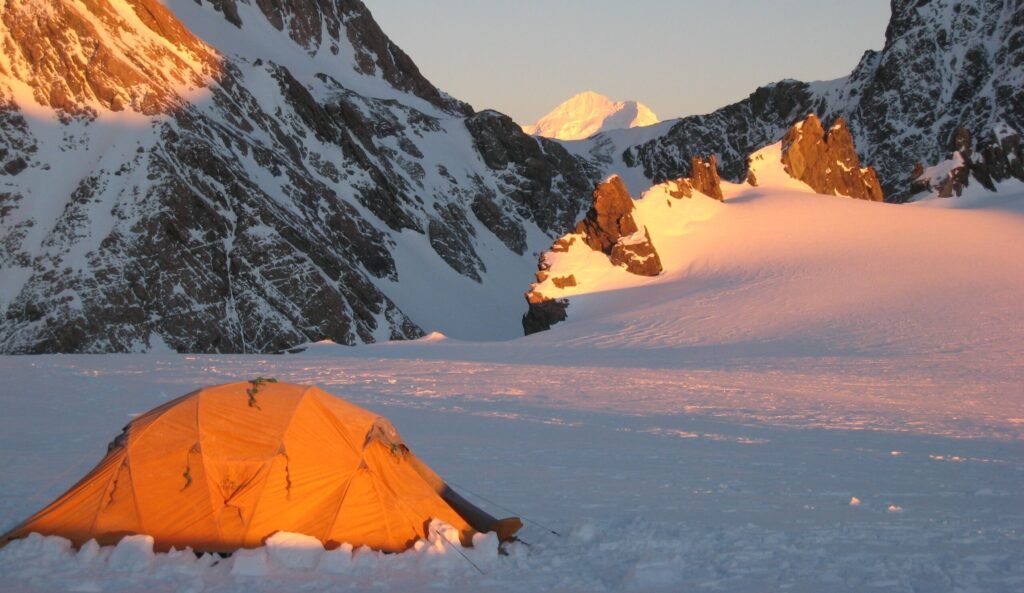 Camp on Baker Glacier with Mt Tasman in the distance